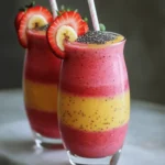 - 1 cup fresh strawberries, hulled and sliced - 1 ripe banana, sliced - 1 cup spinach (optional for added nutrients) Fresh strawberries bring sweetness and flavor. Choose bright red, firm strawberries without blemishes. A ripe banana adds creaminess and natural sugar. It should have a few brown spots for perfect ripeness. Spinach is optional, but it boosts nutrition without changing taste. - 1 cup almond milk (or your preferred milk) - Alternative milk choices Almond milk is light and tasty. It adds creaminess without many calories. You can also use coconut milk, oat milk, or soy milk. Choose what you enjoy most. Each type changes flavor and texture slightly. - 1 scoop vanilla protein powder - Optional add-ins for nutrition Vanilla protein powder enhances flavor and boosts protein. You can use whey, soy, or pea protein based on your diet. Optional add-ins like chia seeds increase fiber and healthy fats. Adding a tablespoon of honey or maple syrup gives extra sweetness. First, we need to clean and slice the strawberries. Rinse them under cool water to remove dirt. Use a sharp knife to hull the strawberries. Cut them into slices, about a quarter-inch thick. This way, they blend smoothly. Next, prepare the banana. Pick a ripe banana for the best flavor. Peel it and slice it into rounds. About half an inch thick is great. This ensures even blending, making a creamy smoothie. Now it’s time to blend! Start by adding the sliced strawberries to the blender. Then, add the banana. If you want extra nutrients, toss in the spinach. Pour in one cup of almond milk next. This helps everything mix well. After that, add the vanilla protein powder and chia seeds. For sweetness, include honey or maple syrup. If you like a cold smoothie, toss in some ice cubes. Blend on high speed until smooth. If the mix gets stuck, stop and scrape down the sides. Blend again until it reaches a creamy texture. Taste your smoothie and adjust the sweetness if needed. Blend again if you add more sweetener. Once blended, pour the smoothie into serving glasses. For a nice touch, garnish each glass. You can add a slice of strawberry or banana on the rim. Sprinkle a few chia seeds on top for extra texture. This makes your smoothie look fun and inviting! Enjoy your delicious strawberry banana protein smoothie! To make a great smoothie, start with ripe strawberries and bananas. Look for strawberries that are bright red with a fresh green top. Avoid any that are dull or have soft spots. For bananas, choose ones with a few brown spots. They should feel firm but slightly soft to the touch. This indicates that they are sweet and ready to use. When it comes to protein powder, pick a brand you trust. Check the label for natural ingredients. Avoid powders with too much sugar or artificial flavors. If you prefer plant-based protein, choose options like pea or hemp protein. They blend well and offer a smooth texture. You can adjust the sweetness and texture of your smoothie. If it’s too sweet, add a bit more almond milk. If you want it sweeter, mix in more honey or maple syrup. Taste as you go to find the right balance. To change the thickness, add ice cubes for a thicker smoothie. If you want it thinner, pour in more almond milk. This lets you customize the drink to fit your preference. Smoothies work well as a quick snack or breakfast. Pair your smoothie with a handful of nuts or a slice of whole-grain toast. This gives you extra energy and keeps you full. For the best experience, serve your smoothie right after blending. It tastes best cold and fresh. You can also garnish it with a slice of strawberry or banana on the rim of the glass. This makes it look nice and adds a fun touch! {{image_2}} You can change the taste of your smoothie easily. Try adding different fruits. Mango or pineapple gives a tropical twist. You can also mix in other greens. Kale blends well and adds extra nutrients. Just remember, balance the flavors. If you follow a vegan diet, swap almond milk for coconut or soy milk. Use a plant-based protein powder too. For gluten-free options, ensure your protein powder is certified gluten-free. You can lower sugar by using less honey or syrup. Stevia is a great low-calorie sweetener. Seasonal fruits can keep your smoothie fresh and fun. In summer, use fresh berries. In winter, try adding orange slices for zest. Adding spices like cinnamon or ginger can enhance flavors. They also offer health benefits. A dash of cinnamon can warm the smoothie and make it unique. To keep your smoothie fresh, store it in the fridge. Use an airtight container. Your smoothie will taste best within 24 hours. If you want to save it longer, freezing is a great option. Pour the smoothie into ice cube trays or freezer bags. This way, you can blend a quick smoothie later. Frozen smoothies can be tricky. To revive one, let it sit out for a bit. You can also run it under warm water. If it’s still too thick, add a splash of milk and blend again. You can use leftovers in other recipes too. Mix it into oatmeal or yogurt for a tasty treat. In the fridge, your smoothie stays fresh for about one day. If you notice an off smell or change in color, it’s time to toss it. Always trust your senses. If it looks or smells bad, don’t eat it. Keeping an eye on your smoothie helps ensure you enjoy it at its best. A Strawberry Banana Protein Smoothie has about 250 to 300 calories per serving. Here’s a quick breakdown of the nutrients: - Strawberries (1 cup): 50 calories - Banana (1 medium): 105 calories - Almond milk (1 cup): 30 to 60 calories, depending on brand - Protein powder (1 scoop): 100 to 150 calories, varies by type - Chia seeds (1 tablespoon): 58 calories - Honey or maple syrup (1 tablespoon): 60 calories (if added) These numbers might change if you adjust ingredients, like using regular milk or more sweetener. Yes, you can skip protein powder. Use other protein sources instead, like: - Greek yogurt - Silken tofu - Nut butter (like almond or peanut) - Cottage cheese These options still give you good protein. They also add creaminess and flavor to your smoothie. You can enjoy a smoothie any time, but it's great before or after a workout. - Pre-workout: It provides energy and nutrients to fuel your workout. - Post-workout: It helps with recovery and muscle repair. A smoothie is a quick snack or meal. Make it fit your schedule and needs! This blog post guides you through making a delicious Strawberry Banana Protein Smoothie. We covered fresh ingredients, liquid bases, and protein options. You learned how to prepare, blend, and serve the smoothie. Plus, tips for choosing ingredients and perfecting texture were shared. Remember, you can adjust flavors and add seasonal fruits to keep it exciting. Store leftovers properly to enjoy later. Try this smoothie as a healthy snack or a post-workout treat. Enjoy your blending adventure, and make it your own!