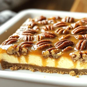 - 1 ½ cups graham cracker crumbs - ½ cup unsalted butter, melted - ¼ cup granulated sugar - 16 oz cream cheese, softened - ½ cup granulated sugar - 2 large eggs - 1 teaspoon vanilla extract - ½ cup sour cream - 1 cup pecans, chopped - ½ cup brown sugar - ¼ cup unsalted butter - ½ cup corn syrup - 1 teaspoon vanilla extract - ½ cup caramel sauce I love how each ingredient plays a role in this treat. For the crust, graham cracker crumbs give a sweet crunch. Melted butter binds it all together. A bit of sugar adds sweetness to balance the flavors. The cheesecake layer is the heart of the bars. Cream cheese gives it that creamy texture. The sugar sweetens it, while eggs add structure. Vanilla extract brings warmth, and sour cream adds a slight tang. The pecan topping is where the magic happens. Chopped pecans add crunch and flavor. Brown sugar and corn syrup create a rich, sweet sauce. Butter helps it all meld together, while more vanilla adds depth. Finally, caramel sauce drizzled on top makes it even better. Gather these ingredients, and you’re ready to create a dessert that everyone will love. - Preheat the oven to 350°F (175°C). - Line a 9x13-inch baking pan with parchment paper. - In a bowl, combine 1 ½ cups graham cracker crumbs, ½ cup melted butter, and ¼ cup sugar. - Mix until the crumbs are coated. Press this mixture into the bottom of the pan. Bake for 10 minutes, then let it cool slightly. - In a large bowl, beat 16 oz softened cream cheese and ½ cup sugar until smooth. - Add 2 large eggs one at a time, then mix in 1 teaspoon vanilla and ½ cup sour cream. Beat until creamy. - Pour the cheesecake mixture over the cooled crust, spreading it evenly. - Bake for 25-30 minutes. The cheesecake should be slightly wobbly in the center. Cool it on a wire rack while you make the pecan topping. - In a saucepan over medium heat, melt ¼ cup butter. Stir in ½ cup brown sugar and ½ cup corn syrup. - Cook for 3-4 minutes until bubbly and smooth. Remove from heat and stir in 1 teaspoon vanilla and 1 cup chopped pecans. - Pour the pecan mixture over the cheesecake layer. Drizzle ½ cup caramel sauce on top. - Bake for another 15-20 minutes until the topping is bubbly and set. To get the best cheesecake texture, start with room temperature cream cheese. Cold cream cheese makes it hard to mix well. Next, when you add eggs, mix gently. Overmixing can make the cheesecake too airy, which is not what we want. For a crisp crust, press the graham cracker mixture firmly into the pan. This helps it hold together well. Bake it until it turns light golden. This adds extra crunch and flavor to your base. I love serving these bars chilled, drizzled with more caramel and extra pecans on top. It looks fancy and tastes amazing! Pairing them with whipped cream adds an indulgent touch that everyone enjoys. {{image_2}} You can add a twist by making chocolate caramel pecan bars. To do this, you need to mix cocoa powder into the crust. This gives a rich, chocolatey flavor. Then, instead of caramel sauce, drizzle some chocolate sauce on top. This will make your bars even more decadent and fun. If you need a nut-free option, it’s simple. Replace the pecans with crushed graham crackers. This keeps the crust crunchy. You can also use sunflower seeds for some crunch. They add a nice texture and flavor without using nuts. You can change the flavors based on the season. For a fall twist, add pumpkin spice to the cheesecake layer. This gives a warm, cozy taste perfect for autumn. In the fall, you can also swap out the caramel for apple pie filling. This creates a lovely apple pecan cheesecake bar that you will enjoy. Store your caramel pecan pie cheesecake bars in an airtight container. This keeps them fresh and tasty. I recommend chilling them in the fridge. Cold bars have the best texture and flavor. If you want to save some for later, freeze the sliced bars. Wrap each piece individually to avoid freezer burn. When you are ready to enjoy, thaw them in the refrigerator. This helps keep the texture nice. These bars are best when eaten within a week if stored in the fridge. For longer storage, consider freezing them. They will taste great even after a few weeks in the freezer. To cut cheesecake bars, use a sharp knife dipped in warm water. This helps you make clean cuts. After each cut, wipe the knife with a cloth. This method keeps the edges neat, so your bars look great. Yes, you can prepare these bars 1 to 2 days in advance. Just store them in the fridge. This can save you time on busy days or special occasions. They stay tasty and fresh, making them perfect for gatherings. When baking, the cheesecake should be slightly wobbly in the center when you take it out. This means it’s set but still creamy. If it looks too firm, it may be overbaked. Trust your instincts; a little wobble is a good sign! You can use Greek yogurt as a substitute for sour cream. It gives a similar tangy taste and creamy texture. This swap works well if you want a healthier option without losing flavor. This post covered how to make delicious cheesecake bars. We explored the crust, cheesecake layer, and pecan topping. I also offered tips for perfecting texture and achieving a crisp crust. You read about fun variations and smart storage info. Enjoying these bars can bring joy to your gatherings. By following these steps, you can impress friends and family with this tasty treat. Baking is fun, and these cheesecake bars are a great way to show off your skills. Happy baking!