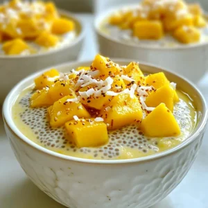 To make Coconut Mango Chia Pudding, gather these key items: - 1 cup coconut milk - 1/2 cup almond milk - 1/4 cup chia seeds - 2 tablespoons maple syrup (or honey) - 1 ripe mango, diced - 1/4 teaspoon vanilla extract - Pinch of salt These ingredients create a creamy and flavorful pudding. The coconut milk and almond milk combine well for a rich texture. Chia seeds not only thicken the pudding but also add nutrition. The ripe mango gives a sweet and tangy taste that brightens the dish. You can elevate your pudding with these fun toppings: - Toasted coconut flakes - Fresh mint leaves - Extra diced mango - Sliced almonds These garnishes add crunch and flavor. Toasted coconut flakes bring a nutty touch, while mint leaves offer freshness. Extra mango gives more fruity goodness, and almonds add a nice crunch. If you need alternatives, here are some ideas: - Use coconut cream instead of coconut milk for a richer flavor. - Swap almond milk with any nut or oat milk. - Replace maple syrup with agave or a sugar alternative. - For a tropical twist, use pineapple or papaya instead of mango. These substitutions help you customize the pudding to fit your taste and diet. Enjoy experimenting with flavors! {{ingredient_image_1}} To get started, gather your ingredients. You need: - 1 cup coconut milk - 1/2 cup almond milk - 1/4 cup chia seeds - 2 tablespoons maple syrup (or honey) - 1 ripe mango, diced - 1/4 teaspoon vanilla extract - Pinch of salt - Toasted coconut flakes for garnish (optional) First, take a medium mixing bowl. Pour in the coconut milk and almond milk. Add the vanilla extract and whisk until everything is mixed well. Next, it's time for the chia seeds. Add them along with the maple syrup and a pinch of salt. Stir the mix well to make sure the chia seeds are spread out evenly. Once your mix is ready, cover the bowl with plastic wrap or put on a lid. Refrigerate it for at least 4 hours. For the best results, let it chill overnight. This time allows the chia seeds to soak up the liquid. They will expand and turn into a gel-like pudding. This is the key to a great chia pudding. When the pudding is set, give it a good stir to make it creamy. Now, it's time to serve! Spoon the chia pudding into individual bowls or glasses. Top it with the diced mango for a burst of sweetness. If you want to add some crunch, sprinkle toasted coconut flakes on top. This makes the dish look fancy and adds great flavor. Enjoy your Coconut Mango Chia Pudding chilled as a tasty treat or a light meal! To get the best chia pudding, start with the right ratio. Use 1/4 cup of chia seeds for every 1.5 cups of liquid. Mix well to avoid clumps. After mixing, let it sit for a few minutes. Stir again to keep seeds from settling. Chill for at least four hours. This helps the chia absorb the liquid and thicken. You can make this pudding even better. Try adding fresh fruits like berries or bananas. A bit of lime juice adds a nice zing. You can also mix in nut butters for creaminess. For a tropical twist, add passion fruit or kiwi. Using toasted coconut flakes as a topping gives it extra crunch. Don’t skip the chilling time! If you serve it too soon, the texture won’t be right. Avoid using too few chia seeds. This leads to a runny pudding. Also, don't forget to stir after mixing. This helps distribute the chia seeds evenly. Lastly, remember to taste it! Adjust the sweetness to your liking before serving. Pro Tips Chia Seed Soak Time: Allow the chia seeds to soak for at least 4 hours, or overnight, for the best texture and consistency. Sweetness Adjustment: Adjust the sweetness by adding more or less maple syrup or honey according to your taste preference. Mango Ripeness: Use a perfectly ripe mango for maximum sweetness and flavor; it should yield slightly to pressure when squeezed. Storage Tips: Store any leftovers in an airtight container in the fridge for up to 3 days for the best freshness. {{image_2}} You can mix up your coconut mango chia pudding with other tropical fruits. Pineapple, kiwi, or passion fruit add a fresh twist. Just chop the fruit and layer it on top of the pudding. You can also blend fruits into the pudding mix for a smooth texture. This creates a fruity explosion in every bite. For a dairy-free and vegan option, stick with coconut milk and almond milk. Both are plant-based, creamy, and delicious. You can also use other non-dairy milks like oat or soy milk. These options still give you the rich taste without any animal products. Always check that any sweeteners you use, like maple syrup, are vegan-friendly. If you want to cut sugar, you can skip the maple syrup or honey. Use ripe mangoes for natural sweetness instead. You can also add a splash of vanilla extract for flavor without extra sugar. If you prefer a sweeter pudding, consider using a sugar substitute. Just make sure it blends well with your taste. I recommend using a glass jar or an airtight container. Glass helps keep the pudding fresh. It also makes it easy to see how much you have left. Make sure the container has a tight lid to prevent odors from other foods. Coconut mango chia pudding lasts about 5 days in the fridge. Store it in the airtight container. Always check for any changes in smell or texture before eating. If you notice anything off, it’s best to toss it. You can freeze chia pudding for up to 3 months. Use freezer-safe containers or bags. When ready to eat, thaw it in the fridge overnight. Stir well after thawing to restore the texture. You might need to add a splash of milk to get it creamy again. Yes, you can use different types of milk. Almond milk and coconut milk work well together. You can also try oat milk or soy milk. Just keep the same total amount of liquid. The chia pudding lasts about five days in the fridge. Store it in an airtight container. This helps keep it fresh and tasty. Yes, coconut mango chia pudding is healthy. It is full of fiber, healthy fats, and vitamins. Chia seeds are great for digestion. The mango adds natural sweetness and vitamin C. Yes, frozen mango works fine. Just make sure to thaw it first. This will help it mix well with the pudding. Chia seeds are tiny powerhouses. They provide fiber, protein, and omega-3 fatty acids. These nutrients help keep you full. They also support heart health and boost energy levels. Coconut mango chia pudding is a simple, tasty treat made with just a few ingredients. We covered how to prepare it, how long to chill, and good ways to serve it. I shared tips on getting the right texture and avoiding common mistakes. You can also try fun variations and gain health benefits from chia seeds. In the end, this dessert is easy to customize and store. Enjoy your pudding with your favorite toppings, or try a new fruit. Whether you are healthy eating or treating yourself, there's a chia pudding for you!