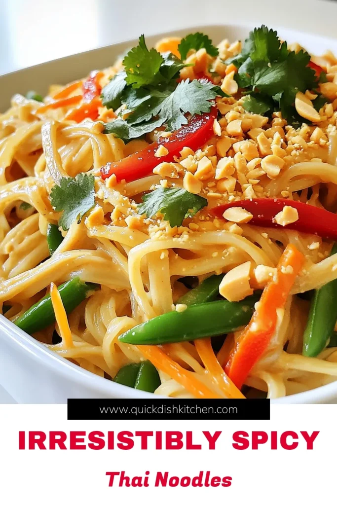 Discover the deliciousness of Spicy Thai Peanut Noodles with this easy recipe! In just 30 minutes, you can whip up a vibrant dish packed with rice noodles, creamy peanut sauce, and fresh veggies that will delight your taste buds. Perfect for a quick weeknight dinner or a flavorful meal prep option. Click through for the full recipe and get cooking today! #ThaiFood #PeanutNoodles #QuickRecipes #EasyCooking