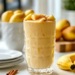 To make the Apple Cinnamon Protein Smoothie, you need simple and fresh ingredients. Here’s what you’ll want to gather: - 1 medium apple, cored and diced (recommended varieties: Fuji or Honeycrisp) - 1 ripe banana - 1/2 cup Greek yogurt (plain or vanilla) - 1 scoop vanilla protein powder - 1/2 teaspoon ground cinnamon - 1 cup almond milk (or any milk of choice) - 1 tablespoon honey (optional) - Ice cubes Each ingredient plays an important role in flavor and nutrition. The apple adds a crunchy sweetness. Bananas bring creaminess and natural sweetness. Greek yogurt boosts protein and gives a smooth texture. The vanilla protein powder helps you stay full longer. Ground cinnamon adds warmth and spice, making each sip comforting. Almond milk keeps it light and refreshing. Honey can sweeten it up, but you can skip it if you prefer. Lastly, the ice cubes make it cool and refreshing. Gather these ingredients, and you're ready to blend a tasty start to your day! {{ingredient_image_1}} 1. First, grab your blender. 2. Toss in the diced apple and banana. 3. Add Greek yogurt and protein powder. 4. Sprinkle in the ground cinnamon. 5. Pour in the almond milk. 6. If you like sweetness, add honey. 7. Next, throw in a few ice cubes. 8. Blend on high until smooth and creamy. - After blending, taste your smoothie. - If it needs more sweetness, add honey. - Blend again to mix in the honey. - Pour the smoothie into a tall glass. - For a nice touch, sprinkle cinnamon on top. - Enjoy your smoothie right away for the best taste! For the best apple cinnamon protein smoothie, choose sweet apples. Fuji and Honeycrisp are my favorites. They blend well and add great flavor. Sweet apples enhance the taste, making your smoothie delicious. To avoid chunky smoothies, blend your ingredients well. Start with the softer fruits, like banana. Yogurt adds creaminess, while almond milk thins the mixture. Adjust the amount of almond milk to reach your desired thickness. When picking protein powder, look for quality brands. Whey and plant-based powders both work well. Choose one that tastes good and fits your diet. Brands like Orgain and Optimum Nutrition are great for flavor and nutrition. Pro Tips Choose the Right Apple: For the best flavor, select a sweet variety like Fuji or Honeycrisp, as they will enhance the smoothie’s taste. Banana Ripeness Matters: Use a ripe banana for added creaminess and natural sweetness; the riper the banana, the sweeter the smoothie. Cinnamon Variation: Experiment with different spices like nutmeg or pumpkin spice for a unique twist on the classic apple cinnamon flavor. Protein Powder Choice: Choose a high-quality protein powder that blends well and complements the flavors; vanilla protein works great in this recipe. {{image_2}} If you want to make this smoothie dairy-free or vegan, there are great swaps. For Greek yogurt, try using coconut yogurt or almond yogurt. Both options keep it creamy and tasty. For protein powder, choose a plant-based version. Pea protein or hemp protein works well. These options are high in protein and fit your dietary needs. You can add fun flavors to your smoothie with spices. A pinch of nutmeg gives warmth, while vanilla extract adds sweetness. Want more fruity goodness? Toss in berries like strawberries or blueberries. You can also blend in greens like spinach for extra nutrients without changing the taste. Making this smoothie ahead can save time. Prep the ingredients the night before. Put them in a bag in the fridge. In the morning, just blend and enjoy. For added ease, store smoothie packs in the freezer. This way, you’ll have quick meals ready to go whenever you need a healthy boost. To keep your smoothie fresh, store it in the fridge. Use a sealed jar or container. This keeps the smoothie cool and helps it last longer. I recommend using glass containers. They don’t hold onto smells. You can freeze your smoothie for later use. Pour the smoothie into ice cube trays or freezer bags. This makes it easy to grab a portion when you need one. To thaw, place it in the fridge overnight or use the microwave on low. Blend it again to get a smooth texture before serving. Enjoy it cold for a quick breakfast boost! An apple cinnamon protein smoothie has about 350 calories per serving. Here's the breakdown: - 1 medium apple: 95 calories - 1 ripe banana: 105 calories - 1/2 cup Greek yogurt: 80 calories - 1 scoop vanilla protein powder: 120 calories - 1 tablespoon honey (optional): 64 calories This smoothie is a great choice for breakfast or a snack. It offers protein, fiber, and natural sweetness. Yes, you can use other types of milk. Almond milk is common, but you can try: - Soy milk: Adds protein and creaminess. - Oat milk: Gives a rich, smooth flavor. - Coconut milk: Adds a tropical twist. Each milk changes the taste a little. Experiment to find your favorite! To make your smoothie more filling, consider these options: - Add more Greek yogurt for extra protein. - Toss in a tablespoon of nut butter for healthy fats. - Use rolled oats to boost fiber. These additions will keep you satisfied longer and enhance the smoothie’s taste. In this blog post, we explored how to make a delicious apple cinnamon protein smoothie. We discussed the best ingredients, preparation steps, and tips for achieving the right texture. I shared variations for different diets and meal prep ideas to save time. Remember, feel free to customize your smoothie to fit your taste. With a bit of creativity, you can enjoy a tasty drink anytime. Now, grab your blender and enjoy this healthy treat!