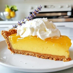 To make a salted honey pie, you will need the following ingredients: - 1 pre-made 9-inch graham cracker crust - 1 cup honey - 3 large eggs - 1/4 cup unsalted butter, melted - 1/2 teaspoon sea salt (plus extra for sprinkling) - 2 tablespoons cornstarch - 1 teaspoon vanilla extract - 1/4 cup heavy cream (for whipped topping) - Fresh lavender or edible flowers for garnish (optional) Each ingredient plays a key role in flavor and texture. The graham cracker crust gives a sweet and crunchy base. Honey adds a rich sweetness. Eggs help set the pie, making it creamy. Unsalted butter enhances the pie's richness. Sea salt balances the sweetness and adds depth. Cornstarch helps thicken the filling. Vanilla extract brings out the flavors. Heavy cream is for a fluffy topping. Finally, garnishes add a touch of beauty. Make sure to choose quality honey for the best taste. If you want to change things up, you can try different types of honey. This pie is simple, yet each ingredient shines through. {{ingredient_image_1}} Start by preheating your oven to 350°F (175°C). This step warms the oven, making it ready for baking. A hot oven helps the pie set just right. In a medium mixing bowl, whisk these ingredients together: - 1 cup honey - 3 large eggs - 1/4 cup unsalted butter, melted - 1/2 teaspoon sea salt - 2 tablespoons cornstarch - 1 teaspoon vanilla extract Whisk until smooth and combined. This mixture creates a sweet and rich filling. Pour your honey filling into the pre-made graham cracker crust. Use a spatula to spread it evenly. Make sure every corner of the crust gets filled. Place the pie in the oven. Bake for 25-30 minutes. You want the filling to be set but still a bit jiggly in the center. Look for puffed edges; they show the pie is baking well. Once baked, take the pie out of the oven. Let it cool to room temperature on the counter. After that, refrigerate it for at least 2 hours. This step lets the flavors mix and helps the filling firm up. In a separate bowl, whip 1/4 cup of heavy cream until soft peaks form. If you like, add a little honey for sweetness. This cream will top your pie beautifully. After chilling, slice the pie into pieces. Top each slice with whipped cream. Add a sprinkle of sea salt on top. If you want, garnish with fresh lavender or edible flowers for a pop of color. Enjoy every bite! To get the right texture for your salted honey pie, keep it soft but not runny. Bake it until the edges puff a bit, but the center should jiggle gently. This means it’s set just right. After baking, let it cool completely. Then, chill it in the fridge for at least two hours. This helps the filling firm up and lets the flavors mix well. Salted honey pie shines with the right flavor balance. Use good-quality honey for a rich taste. A touch of sea salt brings out the sweetness. If you want a hint of depth, try adding a bit more vanilla. Taste your filling before baking. If it feels too sweet, a pinch more salt can help. Sweet and salty make a great team! When it's time to serve, slice the pie with a sharp knife for clean edges. Top each slice with a generous dollop of whipped cream. A sprinkle of sea salt on top enhances the flavor. For a pretty touch, add fresh lavender or edible flowers. This adds color and makes your dessert look special. Enjoy it chilled for the best experience! Pro Tips Use Quality Honey: The flavor of your pie depends significantly on the quality of honey you use. Opt for raw, organic honey for a richer taste. Check for Doneness: The pie should be set but slightly jiggly in the center when done. Overbaking can lead to a dry filling, so keep an eye on it. Chill Before Serving: Allowing the pie to chill for at least 2 hours enhances the flavor and texture, making it easier to slice and serve. Whip the Cream to Order: For the best texture, whip the cream just before serving to ensure it stays light and fluffy. {{image_2}} If you want to change the crust, you have fun choices. Try a shortbread crust for a buttery flavor. A nut crust adds a nice crunch. Use ground almonds or pecans for a twist. You can also try a chocolate cookie crust for a rich taste. This adds depth to the pie and makes it unique. To make your salted honey pie special, think about adding flavor. Citrus zest brightens the honey. Try lemon or orange for a fresh kick. You can also mix in spices like cinnamon or nutmeg. These spices warm up the pie and create a cozy feel. If you like herbal notes, consider adding a bit of rosemary or thyme. These flavors pair nicely with honey. You can make this pie dairy-free or vegan with simple swaps. For the butter, use coconut oil or a vegan butter. Replace the heavy cream with coconut cream for a rich topping. Instead of eggs, mix 1 tablespoon of ground flaxseed with 2.5 tablespoons of water. Let it sit for a few minutes to thicken. These easy changes keep the pie delicious and cater to different diets. To store leftover pie, cover it well. Use plastic wrap or foil. This keeps it fresh. You can store it in the fridge for up to four days. Make sure to keep it chilled. This helps the flavors stay strong and tasty. You can freeze this pie if you have leftovers. First, let the pie cool completely. Then, slice it into pieces. Wrap each slice in plastic wrap. After that, place the slices in a freezer bag. You can freeze them for up to three months. When you're ready to enjoy it, just thaw it overnight in the fridge. To reheat the pie, take it out of the fridge. Let it sit for about 15 minutes at room temperature. This helps it warm up evenly. If you want it warm, place the slices in the oven at 350°F (175°C) for about 10 minutes. Keep an eye on it so it doesn’t overheat. Enjoy it warm with whipped cream! Salted Honey Pie is a sweet and creamy dessert. It has a smooth filling made with honey, eggs, and butter. The pie sits in a crunchy graham cracker crust. The sea salt adds a nice touch to the sweet honey flavor. This dessert is easy to make and is a crowd-pleaser. Yes, you can use a homemade graham cracker crust. Making your own crust can add a fresh taste. Just crush the graham crackers and mix them with melted butter. Press the mixture into a pie dish. Bake it for a few minutes to make it crisp. This gives your pie a personal touch. The pie can last about 4 to 5 days in the fridge. Keep it covered with plastic wrap or foil. This way, it will stay fresh and tasty. If you want to serve it later, make sure to check for any changes in texture or flavor. Yes, it is necessary to refrigerate the pie. Cooling helps the filling set properly. It also allows the flavors to mix and become richer. After baking, cool the pie to room temperature first. Then, chill it for at least 2 hours before serving. This step is key for the best taste. In this post, we covered the basics of making a salted honey pie. You learned about the key ingredients, step-by-step instructions, and tips for a great texture. Variations let you get creative with flavors and crusts. Remember to store leftovers properly to enjoy later. This pie is a sweet treat that balances flavor and texture. Try making it yourself for a delightful dessert. Happy baking!